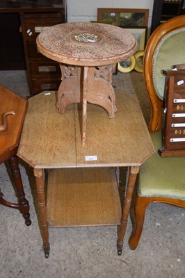 Lot 450 - Small octagonal oak two tier side table on...