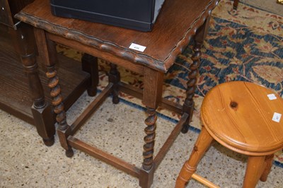 Lot 456 - An oak occasional table on barley twist legs