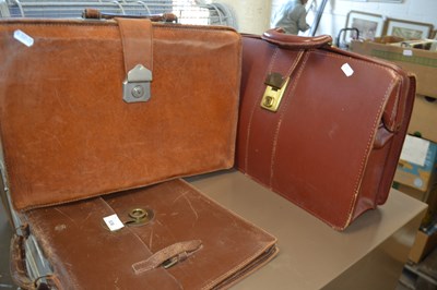 Lot 836 - Three leather briefcases