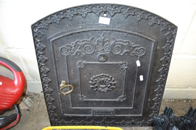 Lot 906 - Cast iron oven door front