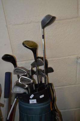 Lot 930 - Golf caddy and assorted clubs