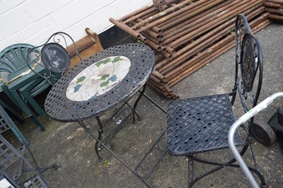 Lot 972 - Metal garden table and two chairs