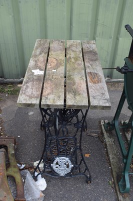 Lot 985 - Garden table with Singer sewing machine base