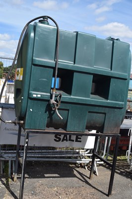 Lot 990 - Large green plastic fuel tank and stand