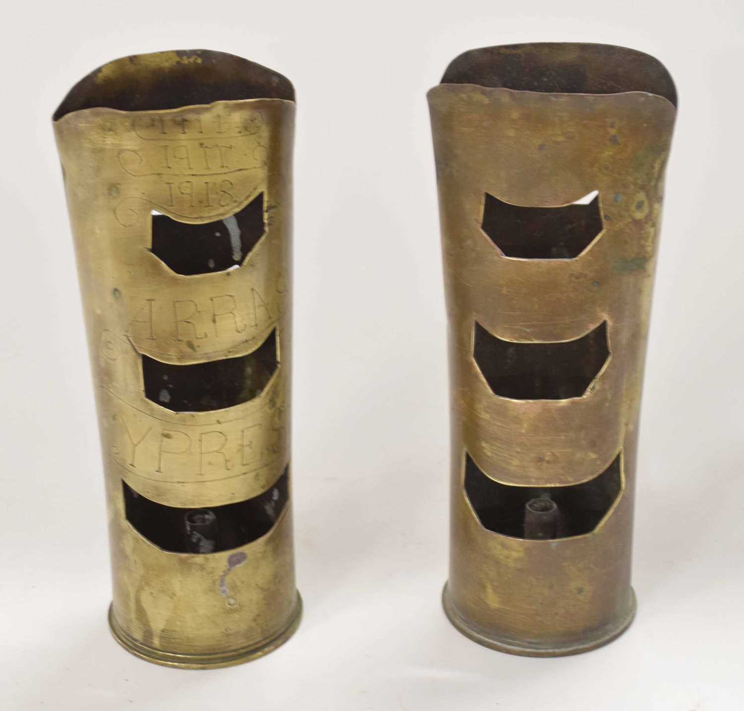 Lot 73 - Pair of WWI trench art shells '1916, 1917,...