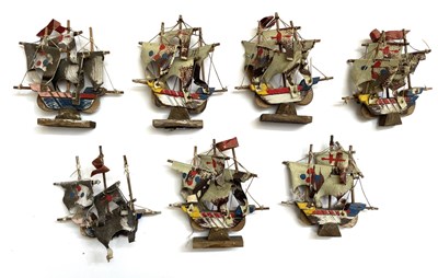 Lot 145 - A set of leather and wooden Armada ships,...