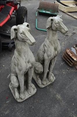 Lot 114 - Pair of seated whippets, height approx 182cm
