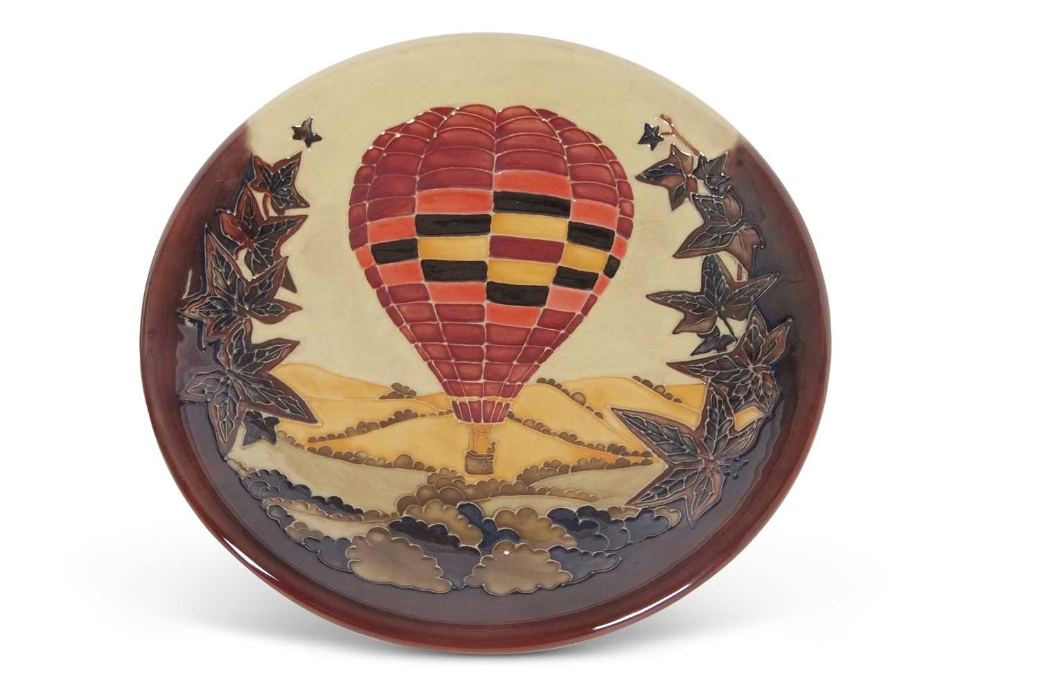 Lot 65 - A Moorcroft ballooning charger commissioned by...