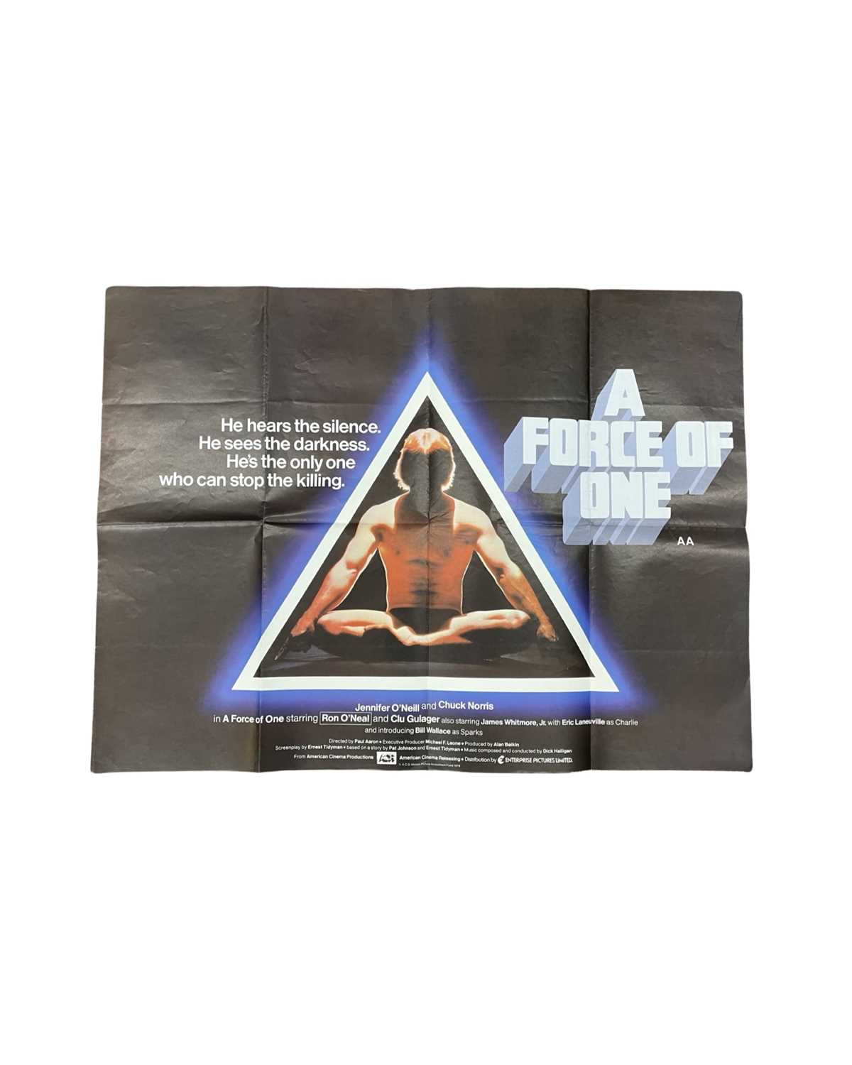 Lot 142 - A quad film poster for A Force of One (1979),...