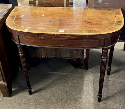 Lot 576 - Georgian mahogany and cross banded card table...