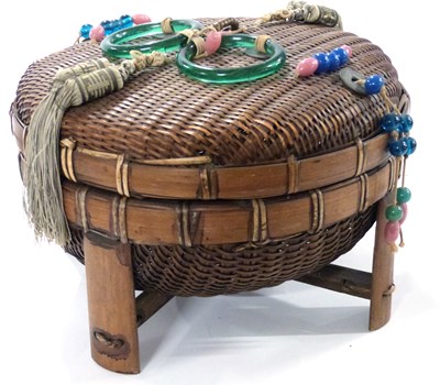 Lot 407 - A tribal circular basket and cover with bead...