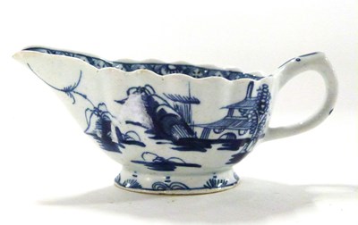 Lot 426 - A Bow porcelain butter boat with blue and...