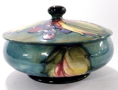 Lot 441 - Moorcroft circular box and cover, the green...