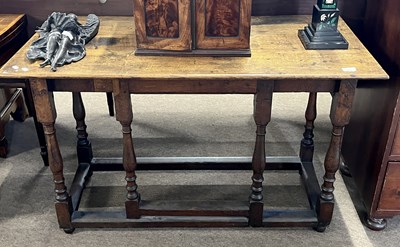 Lot 573 - Rectangular oak hall table, the base...