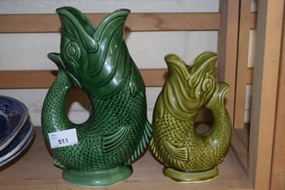 Lot 511 - Two Dartmouth fish vases