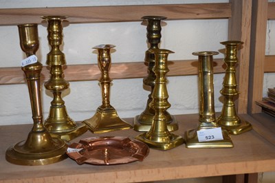 Lot 523 - Quantity of copper and brass candlesticks and...