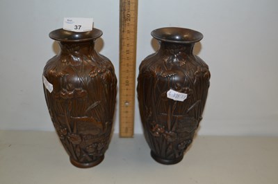 Lot 37 - A pair of small Japanese bronzed metal vases...