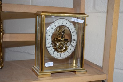Lot 592A - The London Clock Company brass and glass case...