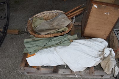 Lot 217 - Quantity of canvas tarps and a wicker basket