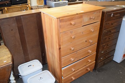 Lot 762 - Pine chest of drawers of two short and five long
