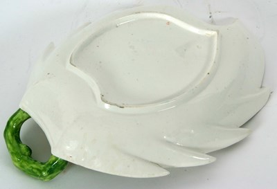 Lot 89 - A Chelsea porcelain leaf dish with shaped rim...