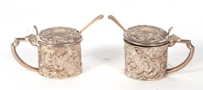 Lot 10 - A pair of small Edwardian silver mustards of...