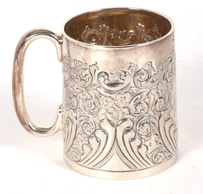Lot 13 - A Victorian silver christening mug, embossed...