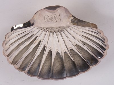 Lot 48 - Large silver shell shaped dish, the handle...