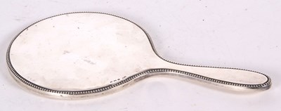 Lot 53 - A hallmarked silver backed mirror of plain...