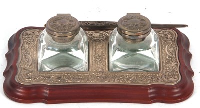 Lot 59 - An Elizabeth II silver mounted twin bottle ink...