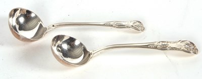 Lot 65 - Two Kings pattern sauce ladles having oval...