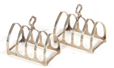 Lot 66 - A pair of Art Deco silver toast racks of...