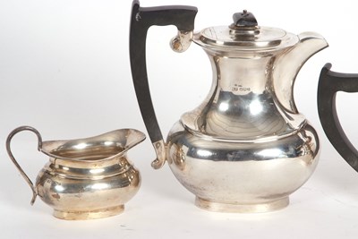 Lot 82 - George VI silver four piece tea service...