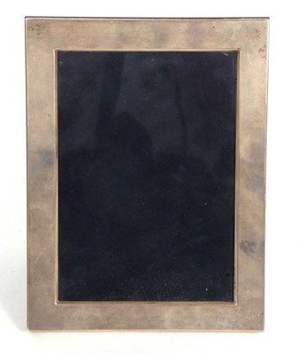 Lot 89 - Elizabeth II silver photograph frame of plain...