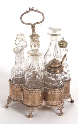 Lot 93 - A Victorian silver framed seven bottle cruet...