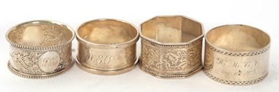 Lot 132 - A group of four hallmarked silver serviette...