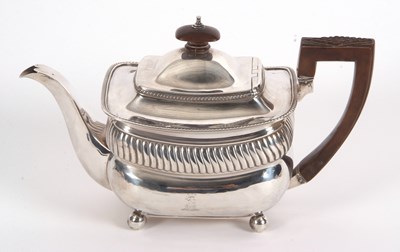 Lot 182 - A George III silver teapot of oval form having...