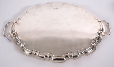 Lot 184 - An Elizabeth II large silver twin handled tray...