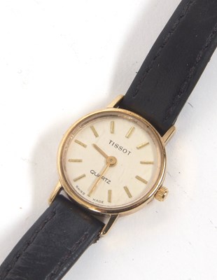 Lot 379 - A 9ct gold cased Tissot lady's wristwatch,...