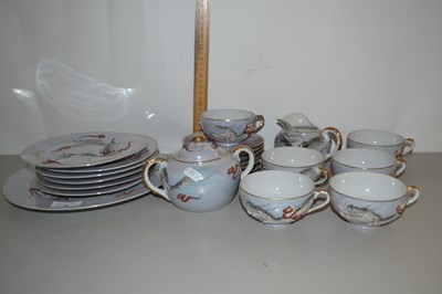 Lot 8 - A Japanese eggshell part tea service