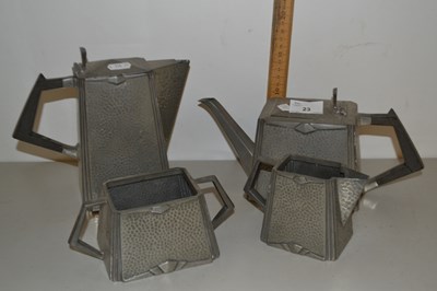 Lot 23 - Hammered pewter four piece tea set