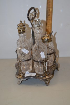 Lot 48 - Silver plated cruet stand with bottles