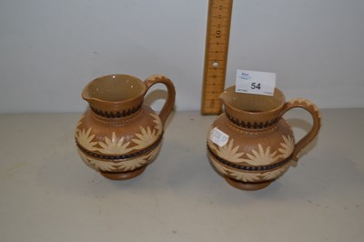 Lot 54 - Pair of small Doulton jugs