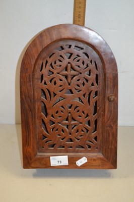 Lot 73 - Modern hardwood key cabinet with fretwork door