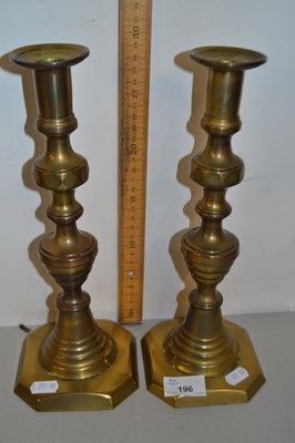 Lot 196 - Pair of brass candlesticks