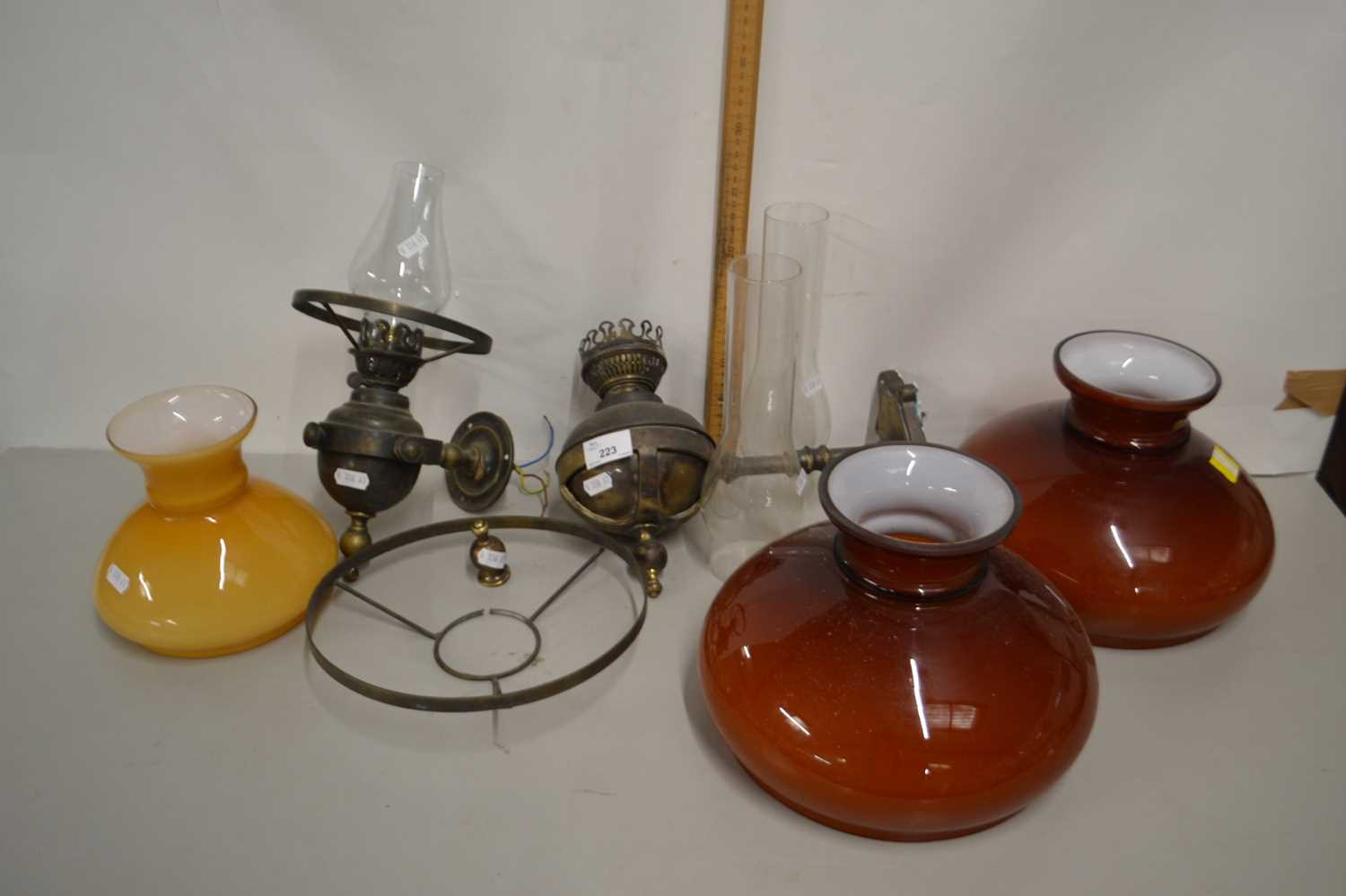Lot 223 Pair of wall mounted oil lamps with