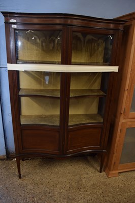 Lot 265 - An Edwardian mahogany serpentine front display...