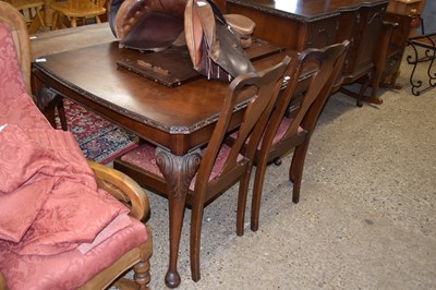 Lot 330 - An early 20th Century walnut veneered dining...