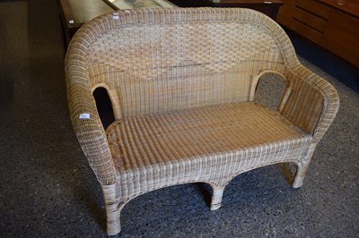 Lot 333 - Wicker work two seater conservatory sofa