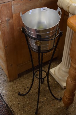 Lot 338 - A modern metal chapagne bucket and stand